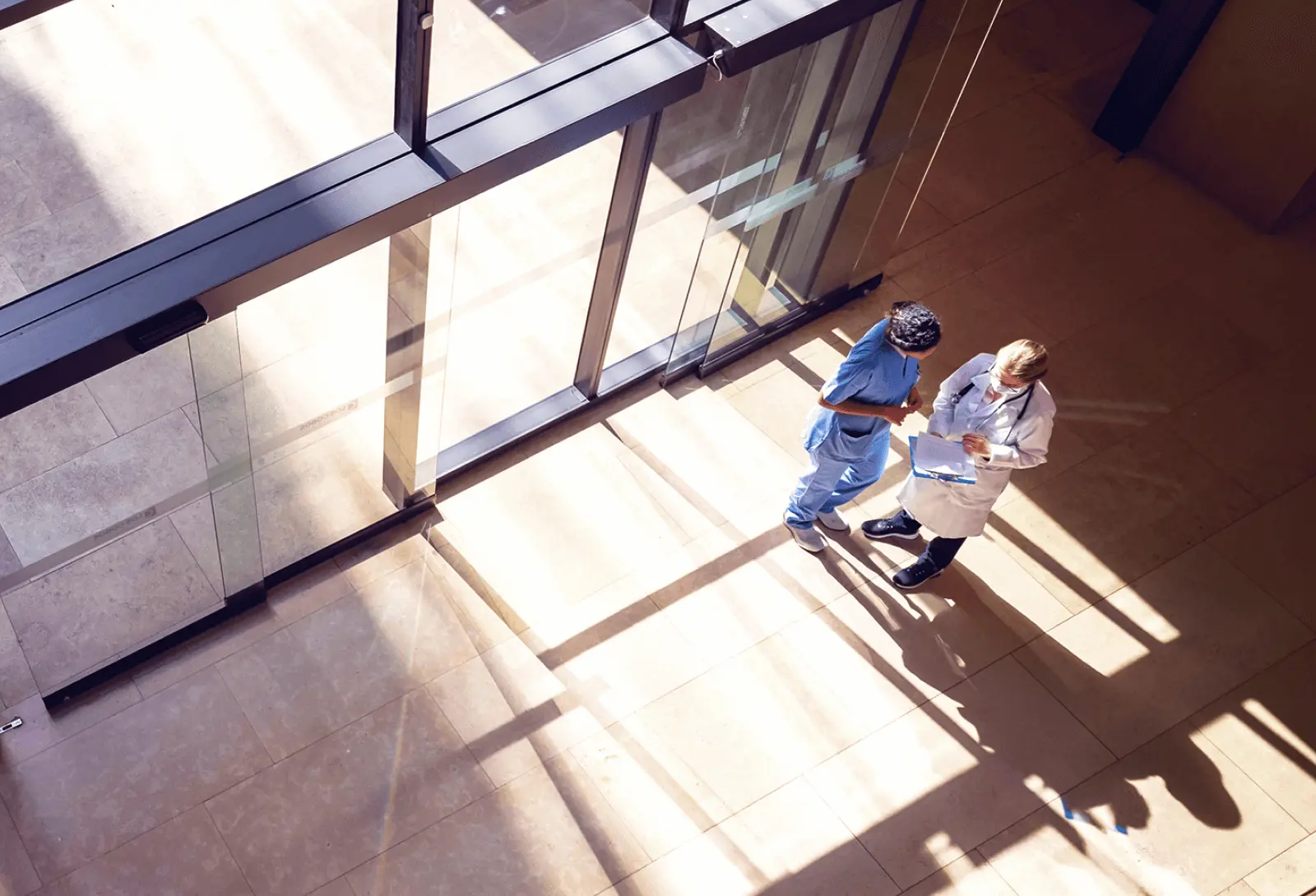 Healthcare graphic showing medical professionals and patient care elements