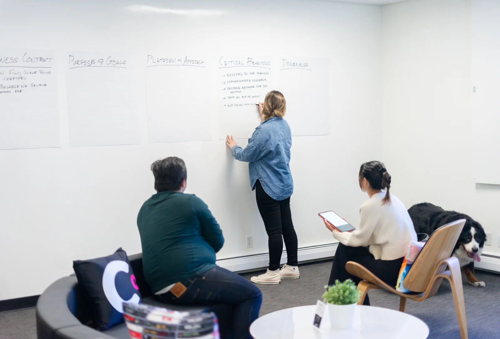 team collaborating in modern office environment representing digital strategy, project management, and business operations