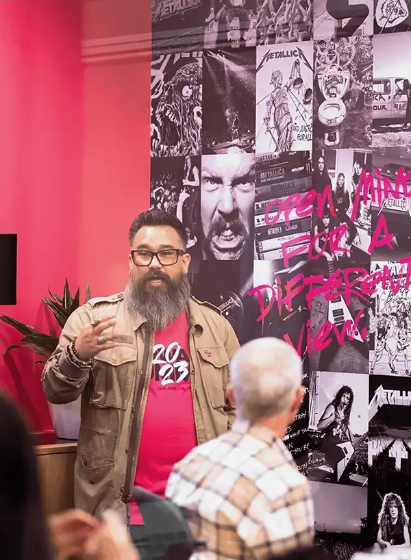 Creative Director Danny Halvorson working with design team.