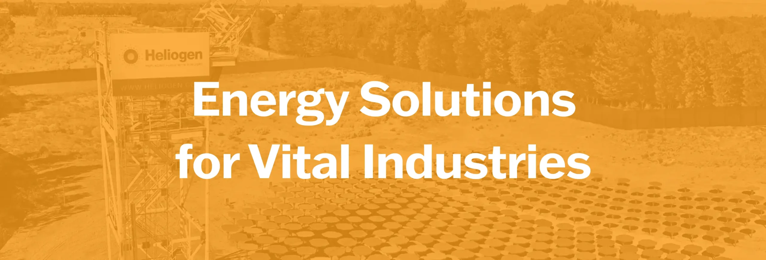 Heliogen banner reading Energy Solutions for Vital Industries over a solar field background.